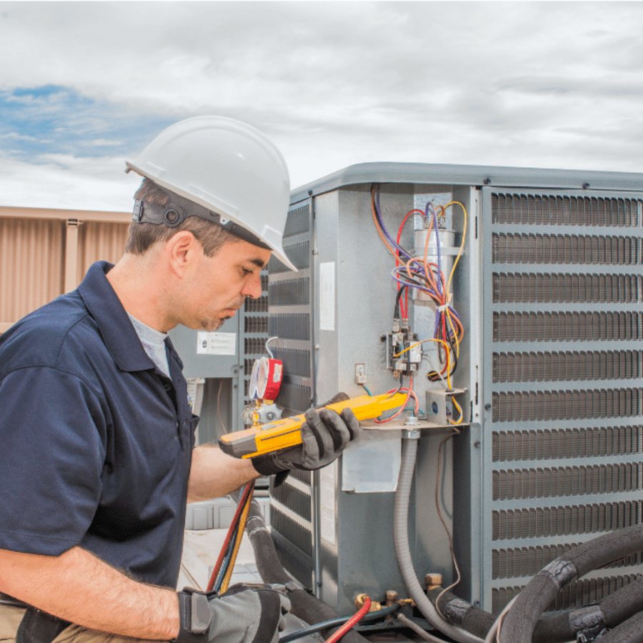 Kitchener HVAC Pros HVAC technician servicing a system